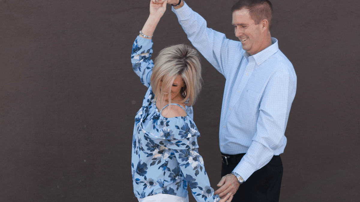 Three and Jackie Carpenter dancing together | Contact Us Header